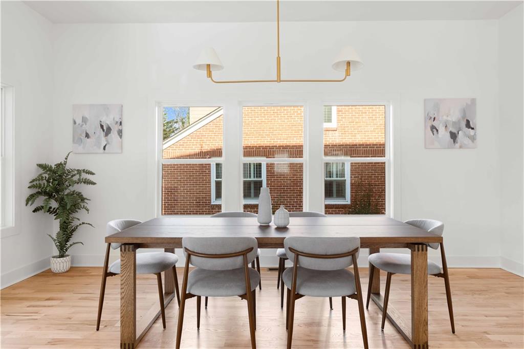286 Sisson Avenue Northeast Atlanta, GA 30317 - Photo 17 of 56 a view of a dining room with furniture and window