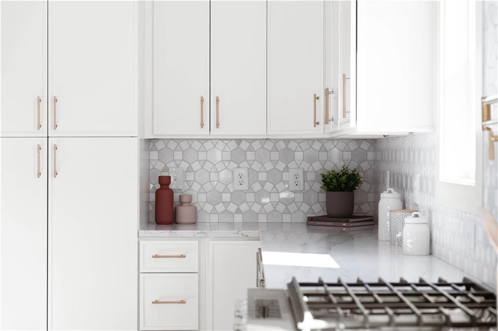 286 Sisson Avenue Northeast Atlanta, GA 30317 - Photo 20 of 56 a kitchen with a sink and cabinets