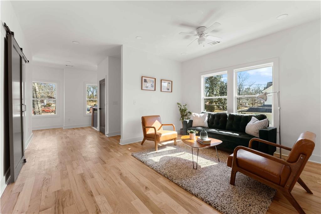 286 Sisson Avenue Northeast Atlanta, GA 30317 - Photo 25 of 56 a living room with furniture and a window