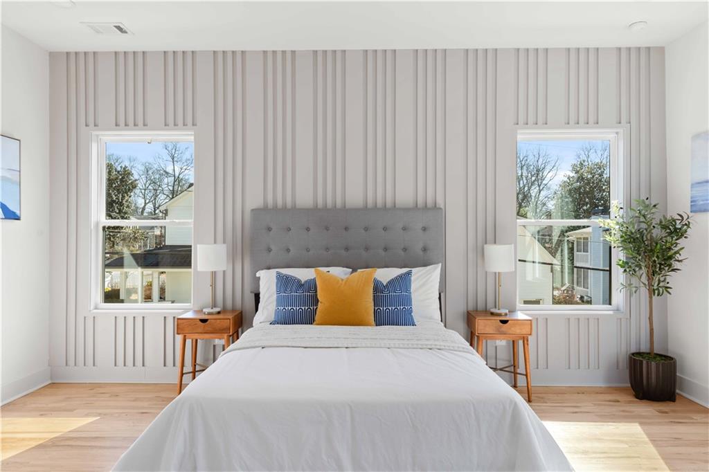 286 Sisson Avenue Northeast Atlanta, GA 30317 - Photo 32 of 56 a bedroom with a bed and a window