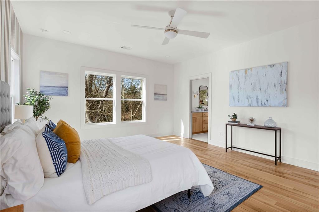 286 Sisson Avenue Northeast Atlanta, GA 30317 - Photo 38 of 56 a bed room with a bed and a window