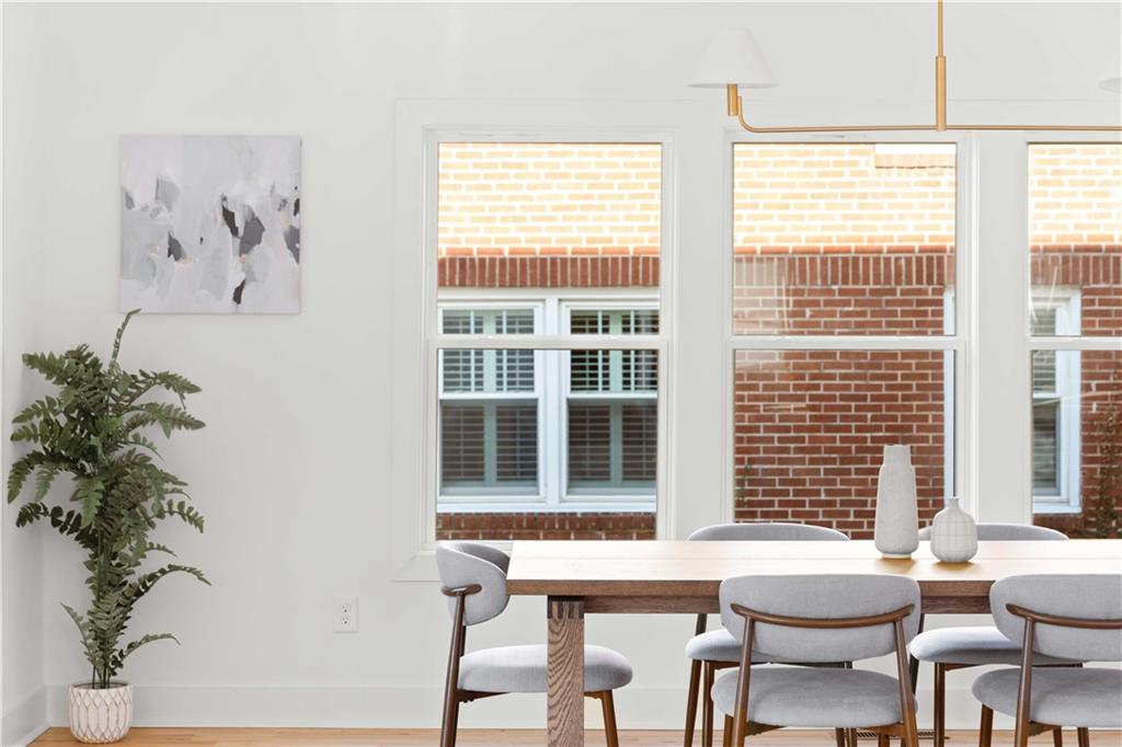 286 Sisson Avenue Northeast Atlanta, GA 30317 - Photo 4 of 56 a view of a dining room with furniture and windows