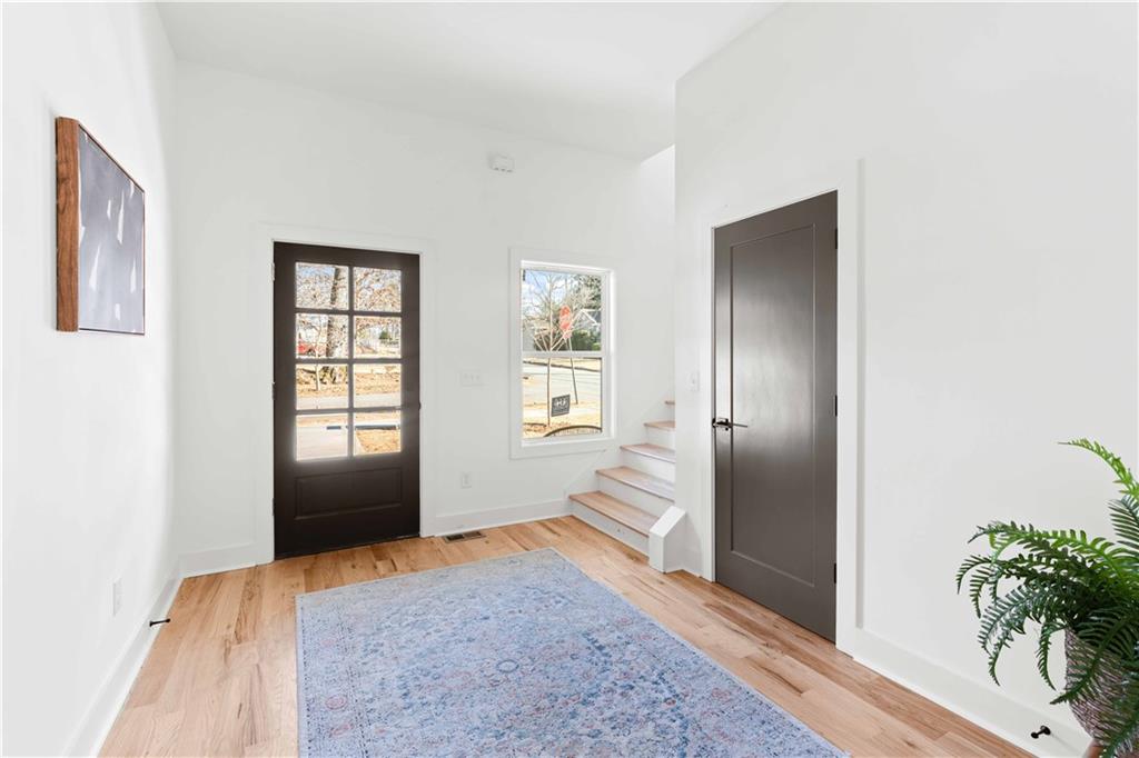 286 Sisson Avenue Northeast Atlanta, GA 30317 - Photo 8 of 56 a view of empty room with front door