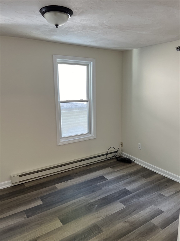 12 Aspen Street Ware, MA 01082 - Photo 13 of 17 an empty room with a window