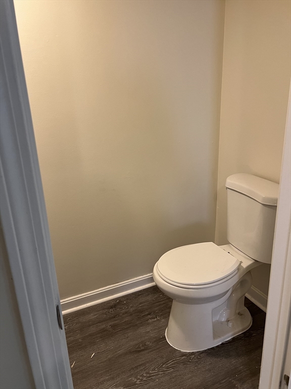 12 Aspen Street Ware, MA 01082 - Photo 16 of 17 a white toilet sitting in a bathroom