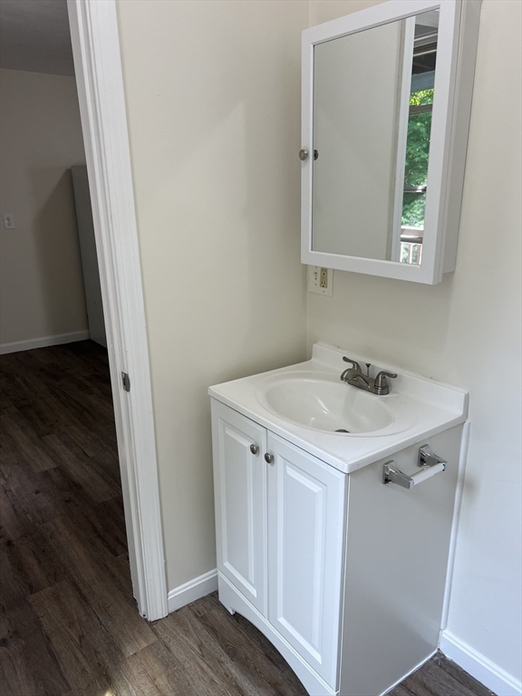 12 Aspen Street Ware, MA 01082 - Photo 5 of 17 a utility room with cabinets washer and dryer