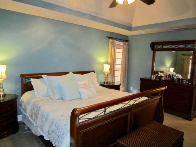 1450 Johnson Road Macon, GA 31220 - Photo 11 of 23 a bed room with a bed window and dresser
