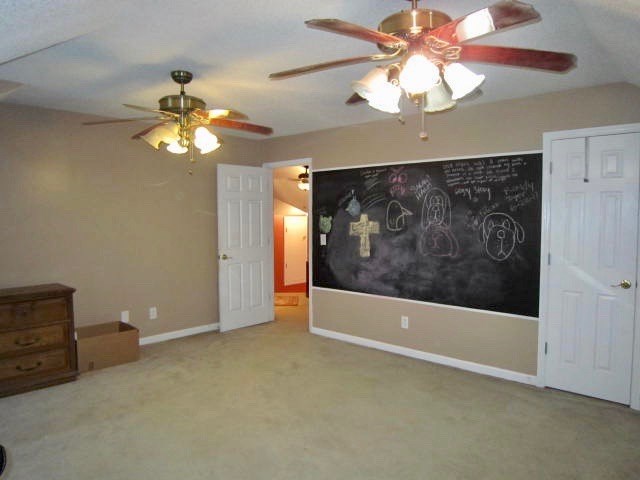 1450 Johnson Road Macon, GA 31220 - Photo 18 of 23 a view of a livingroom with a chandelier fan