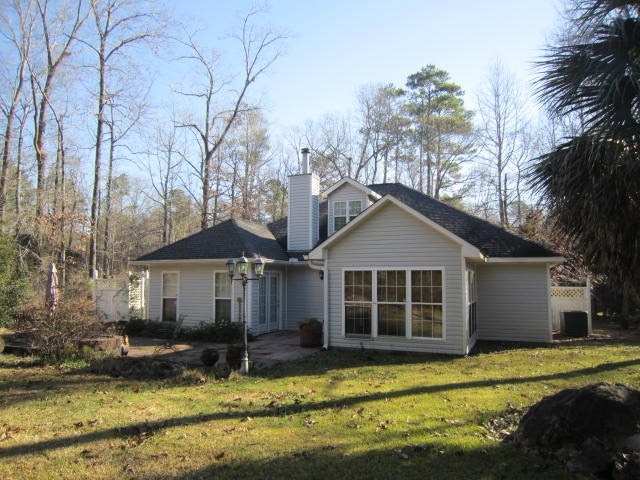 1450 Johnson Road Macon, GA 31220 - Photo 21 of 23 a house with swimming pool in front of it