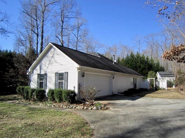 1450 Johnson Road Macon, GA 31220 - Photo 23 of 23 a view of a house with a yard and large tree