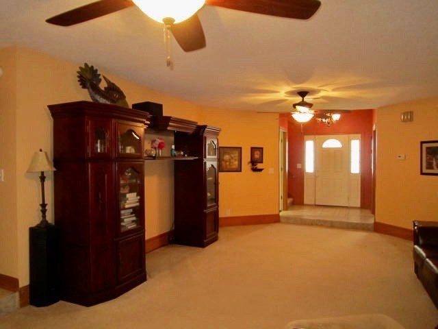 1450 Johnson Road Macon, GA 31220 - Photo 4 of 23 a view of a livingroom with furniture and chandelier