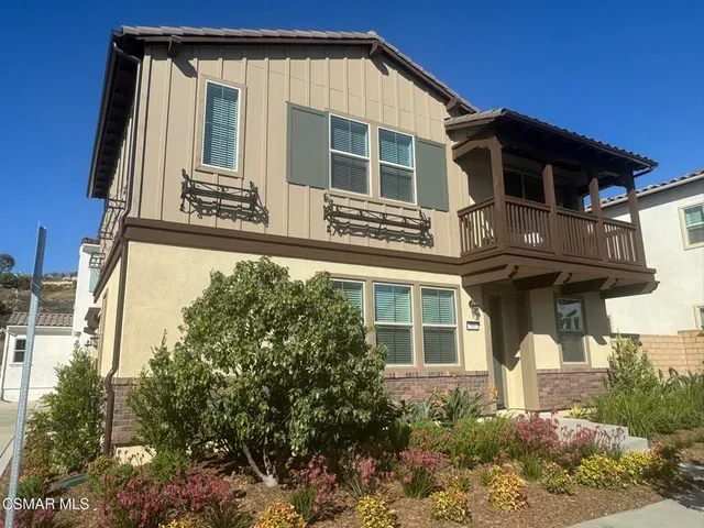 a front view of a house with balcony