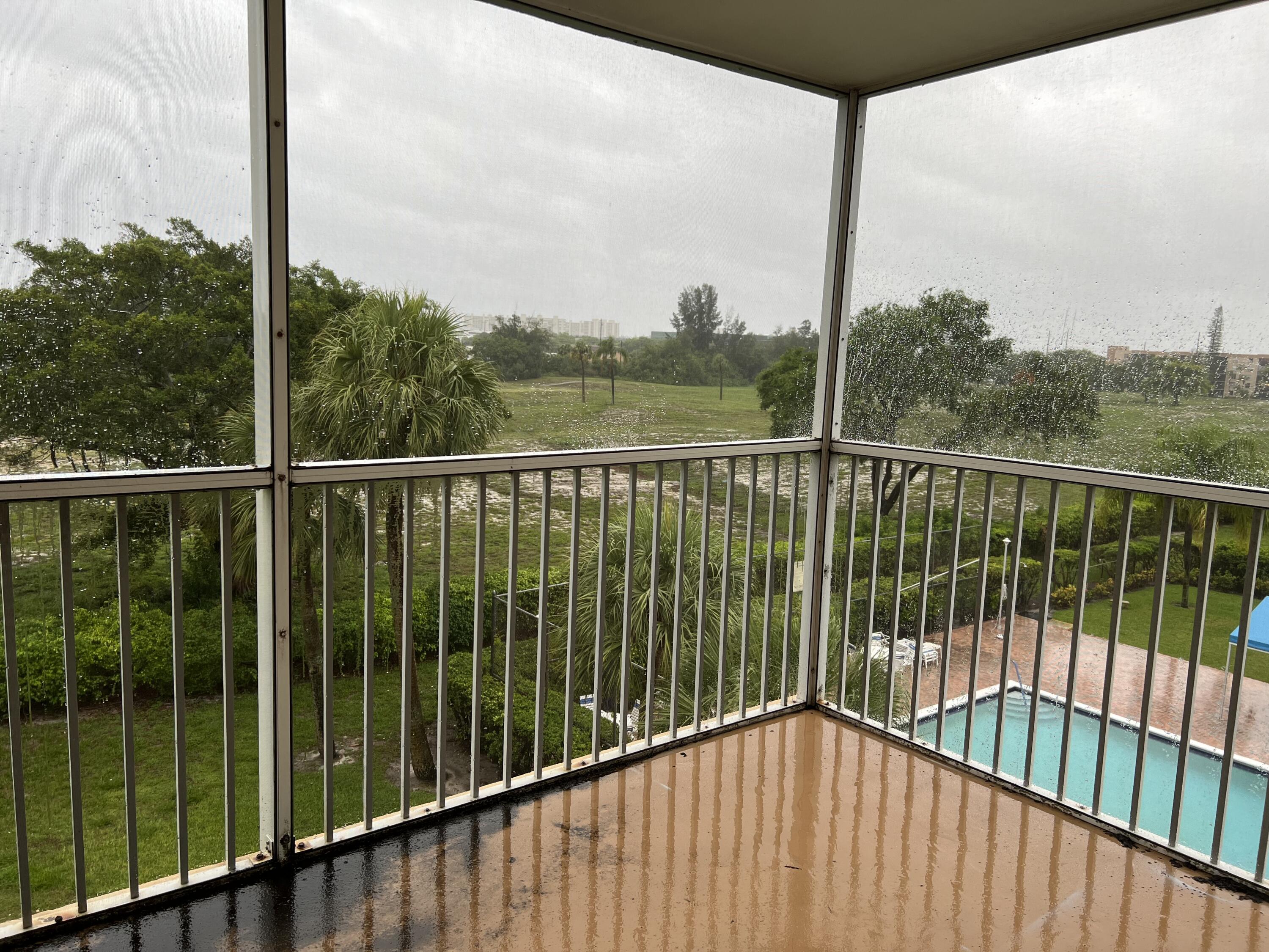 5700 Northwest 2nd Avenue, Unit 412 Boca Raton, FL 33487 - Photo 17 of 17 SCREENED PATIO RIGHT