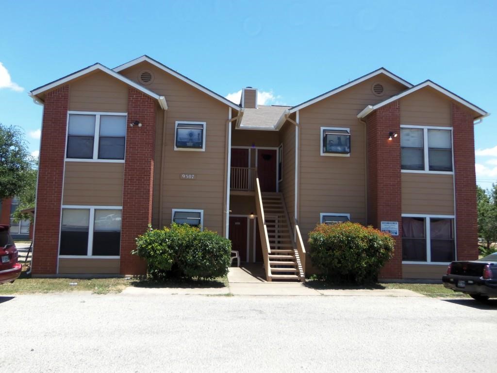 9508 Kempler Drive Austin, TX 78748 - Photo 1 of 1 a front view of a house with yard and parking