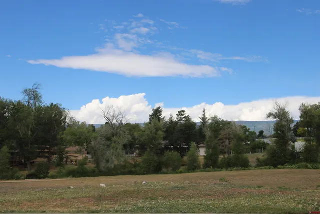 a view of mountain with lake view
