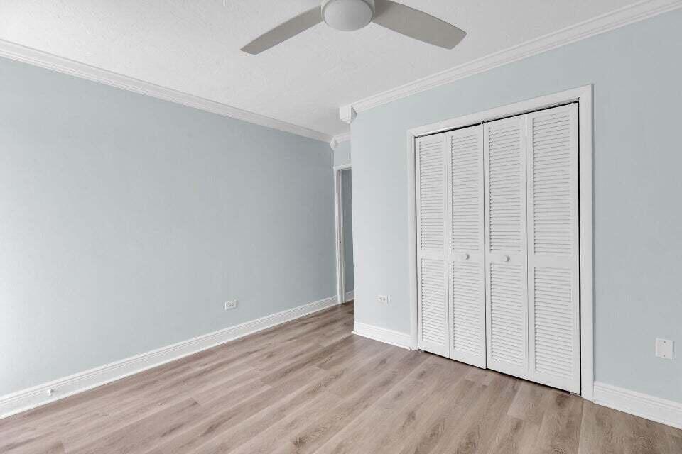 300 Duck Key Drive, Unit 9 Duck Key, FL 33050 - Photo 13 of 22 a view of an empty room with wooden floor