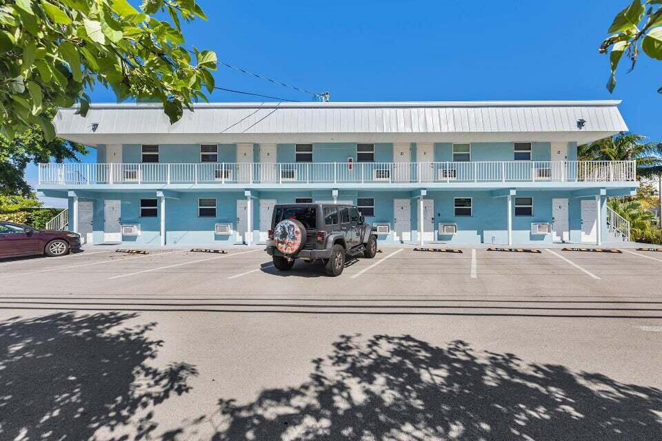 300 Duck Key Drive, Unit 9 Duck Key, FL 33050 - Photo 18 of 22 a front view of a building with street view