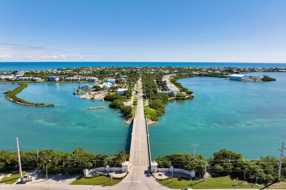 300 Duck Key Drive, Unit 9 Duck Key, FL 33050 - Photo 22 of 22 a view of a lake with houses