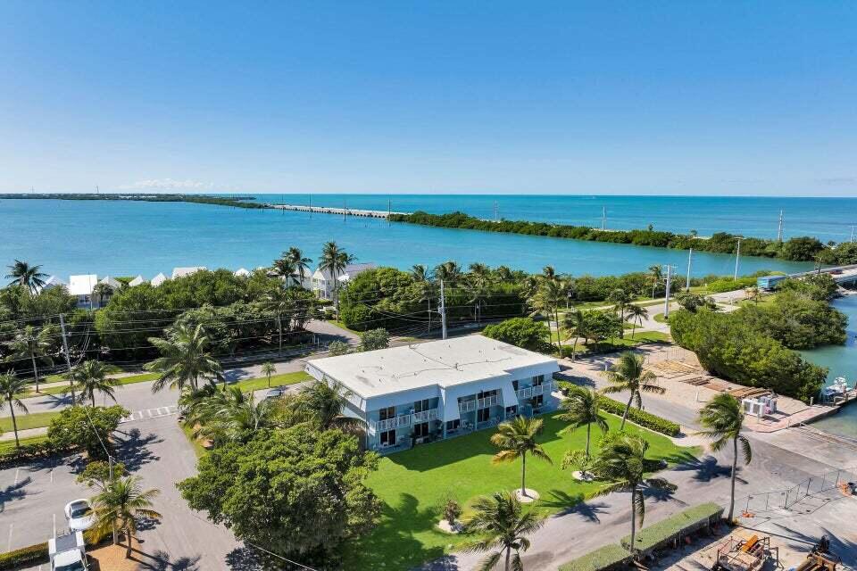 300 Duck Key Drive, Unit 9 Duck Key, FL 33050 - Photo 3 of 22 an aerial view of a house with a lake view