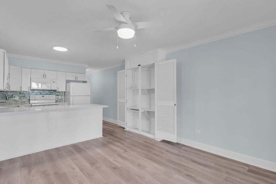 300 Duck Key Drive, Unit 9 Duck Key, FL 33050 - Photo 7 of 22 a view of kitchen with wooden floor