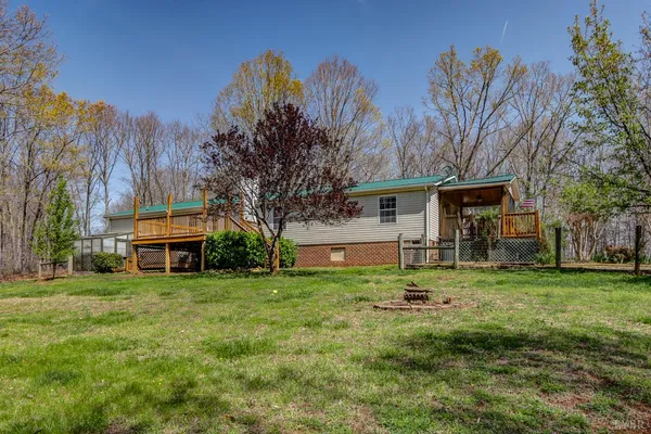 a view of balcony with wooden floor