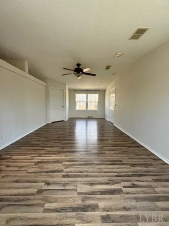 a kitchen with stainless steel appliances granite countertop a refrigerator stove and sink