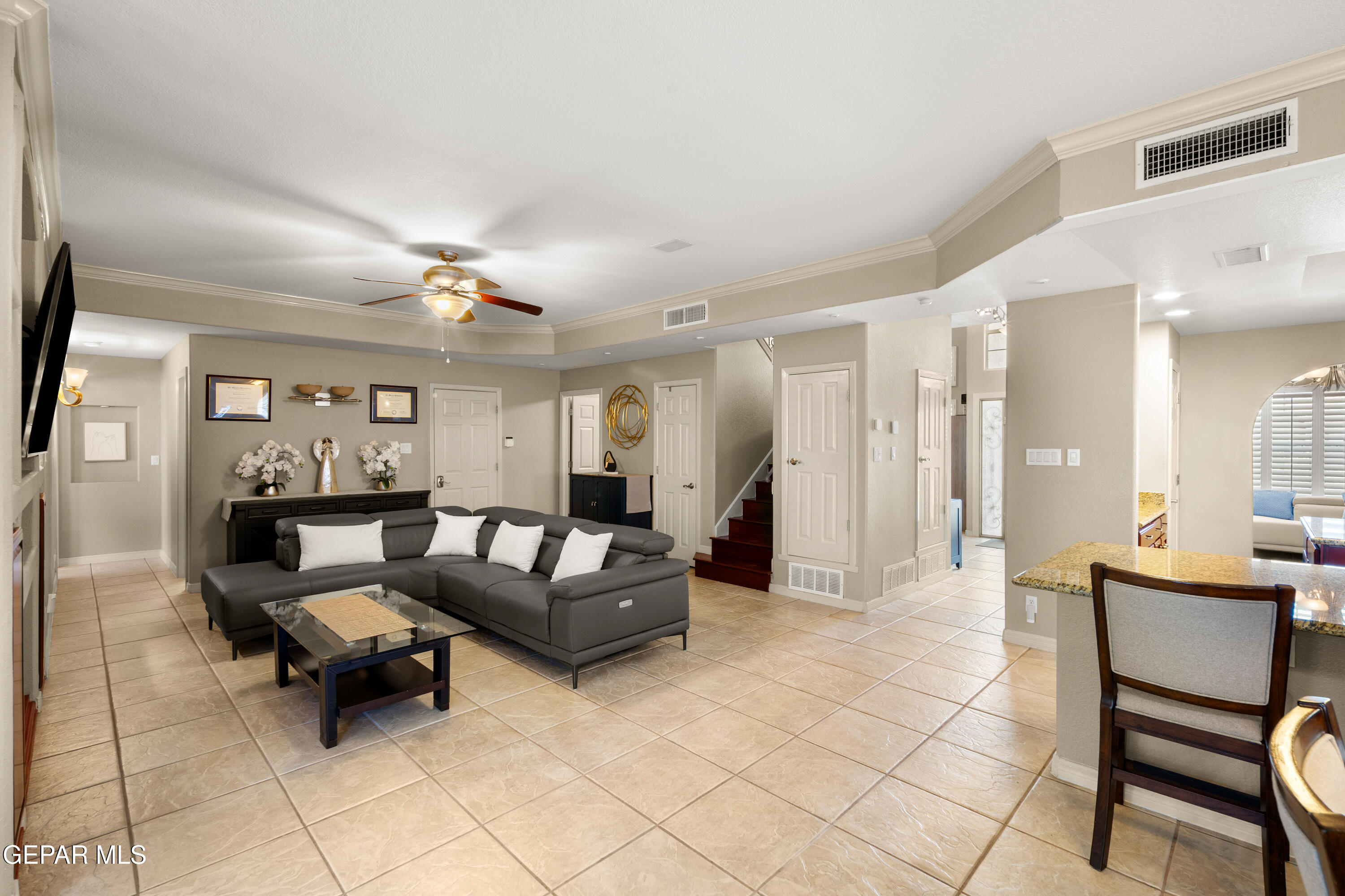 6705 Pearl Ridge Drive El Paso, TX 79912 - Photo 13 of 58 a living room with furniture and a dining table with kitchen view