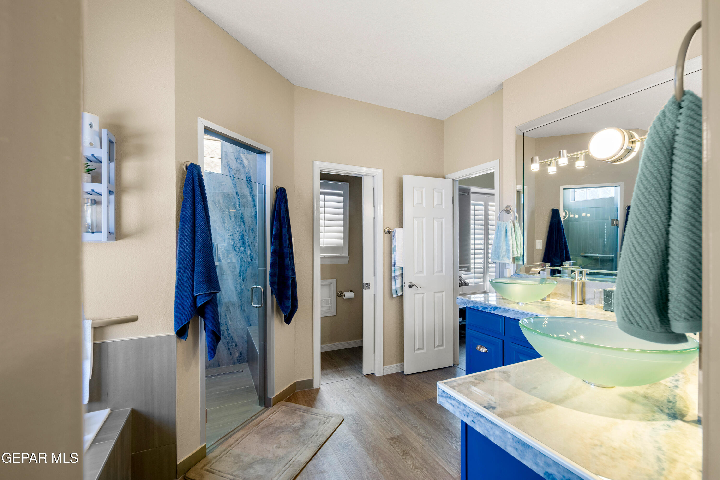 6705 Pearl Ridge Drive El Paso, TX 79912 - Photo 24 of 58 a large bathroom with a tub and shower