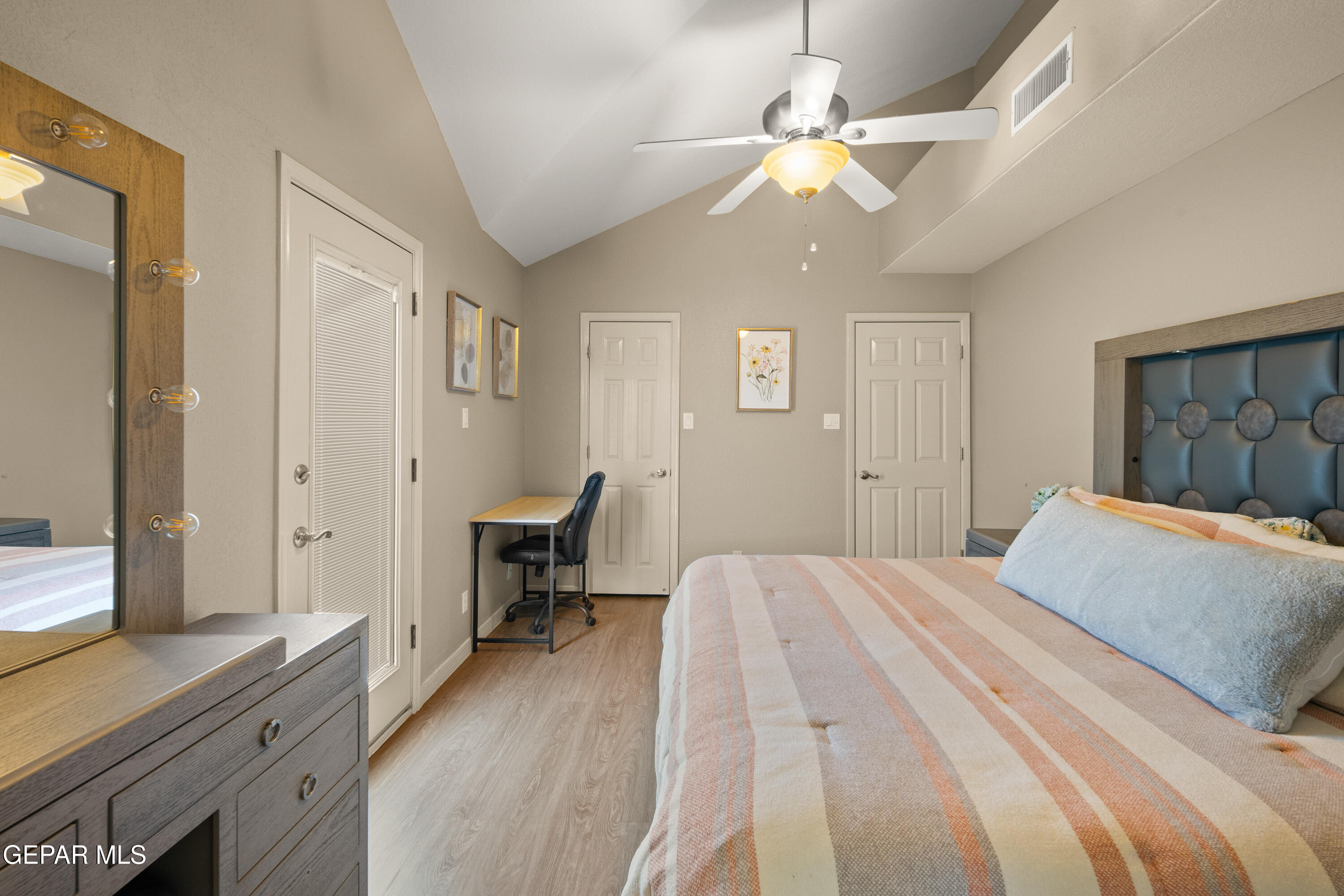 6705 Pearl Ridge Drive El Paso, TX 79912 - Photo 40 of 58 a bedroom with a bed and a desk