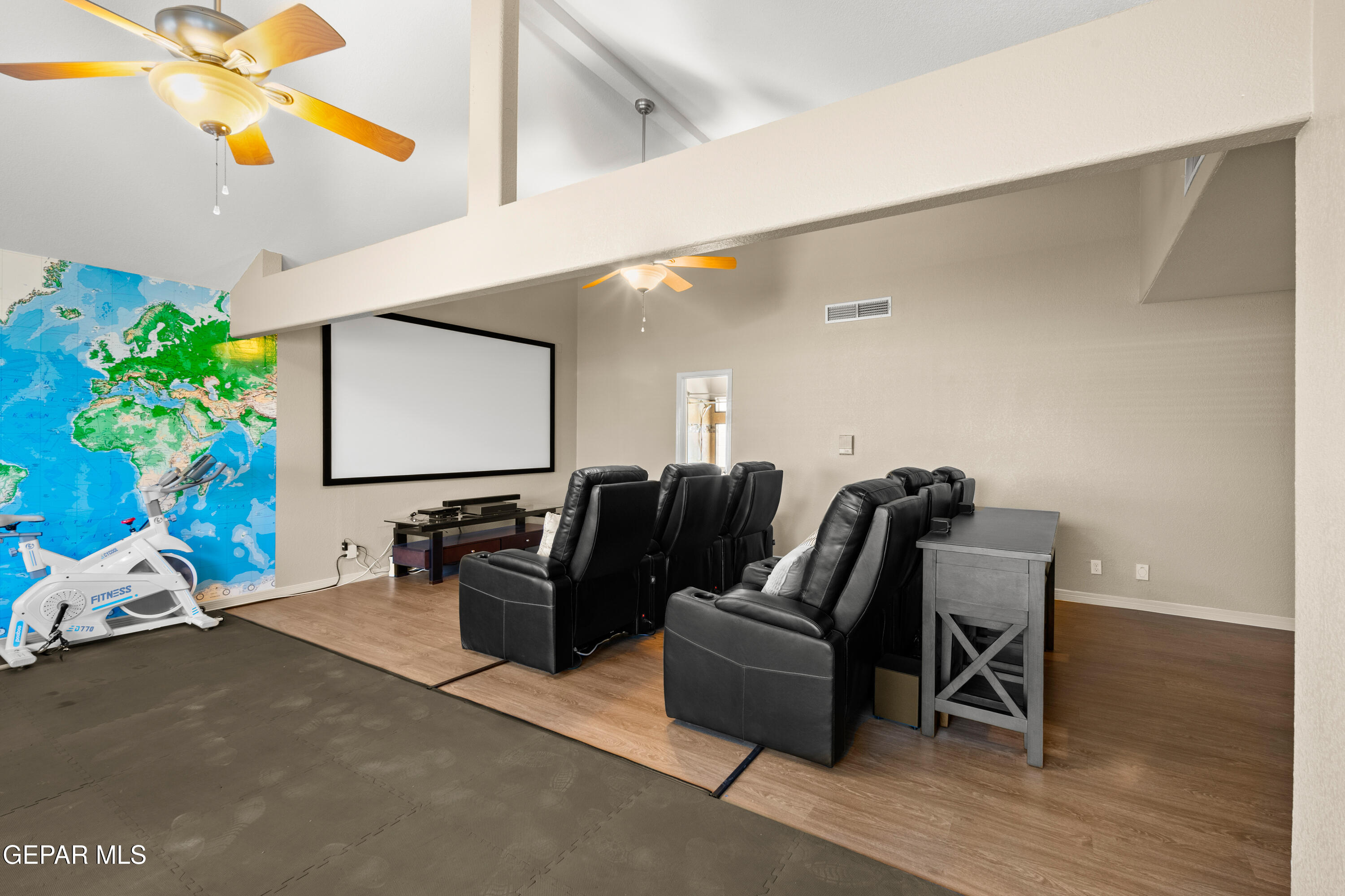 6705 Pearl Ridge Drive El Paso, TX 79912 - Photo 44 of 58 a living room with furniture and a flat screen tv