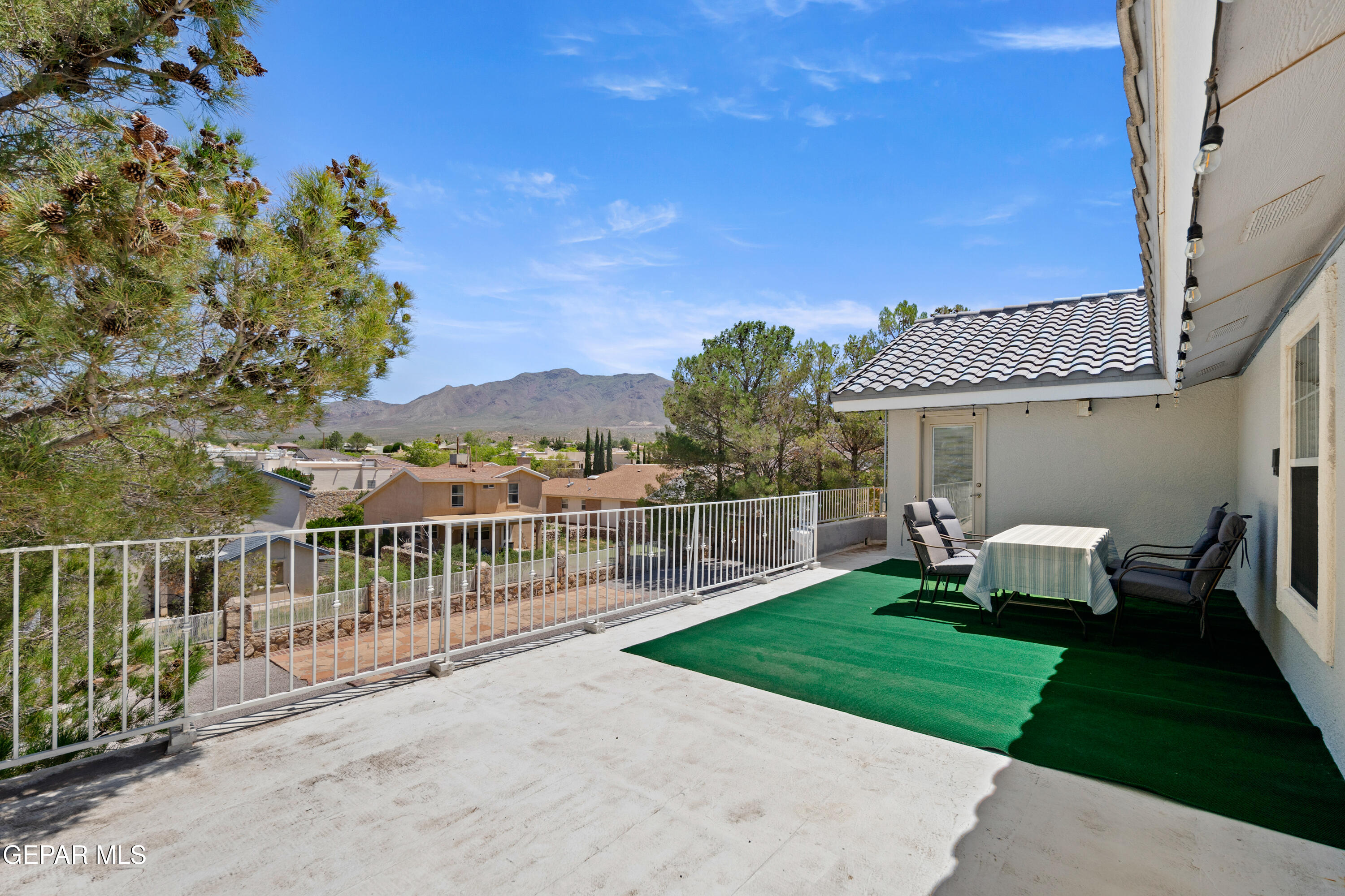 6705 Pearl Ridge Drive El Paso, TX 79912 - Photo 51 of 58 a view of a house with backyard and a garden