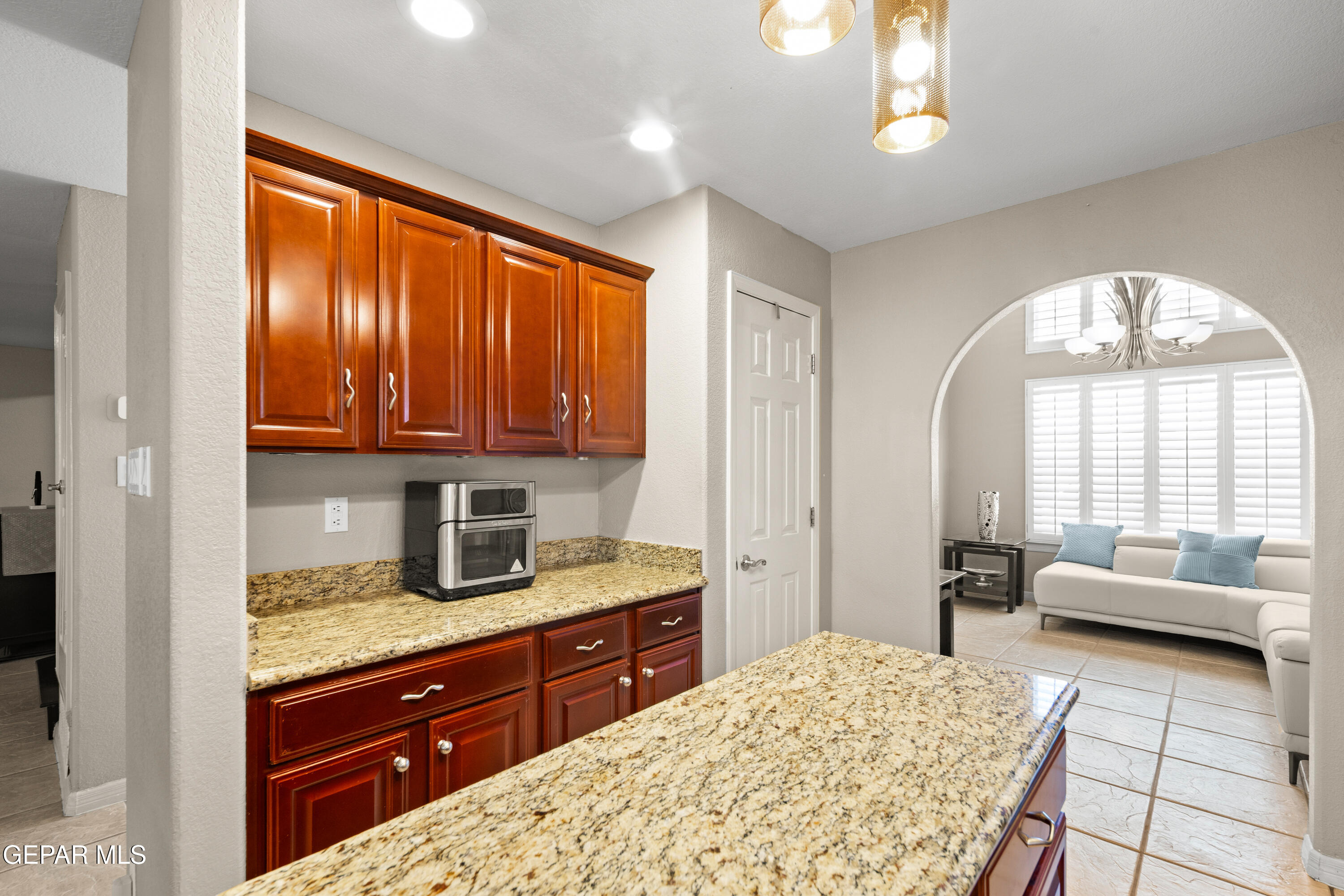 6705 Pearl Ridge Drive El Paso, TX 79912 - Photo 10 of 58 a bedroom with a bed and a dresser