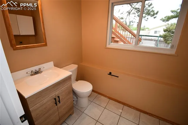 a view of outdoor space deck and tree