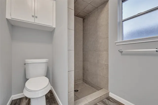 a bathroom with a sink vanity and mirror