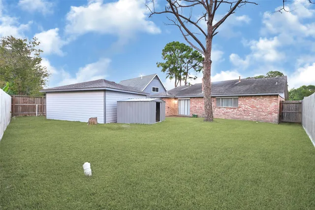 a view of a backyard with a garden