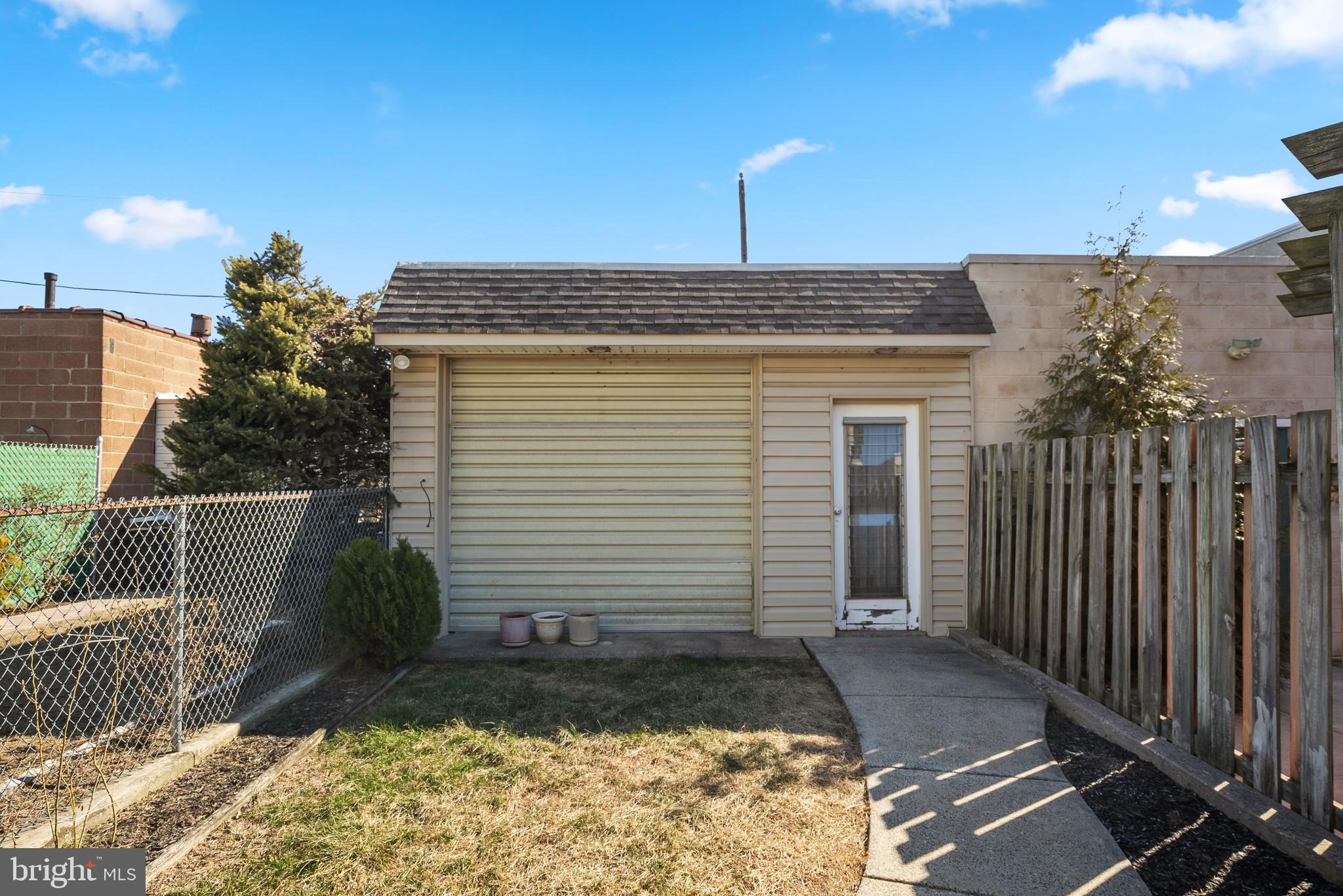 3313 Edgemont Street Philadelphia, PA 19134 - Photo 21 of 22 a view of a house with backyard and garden