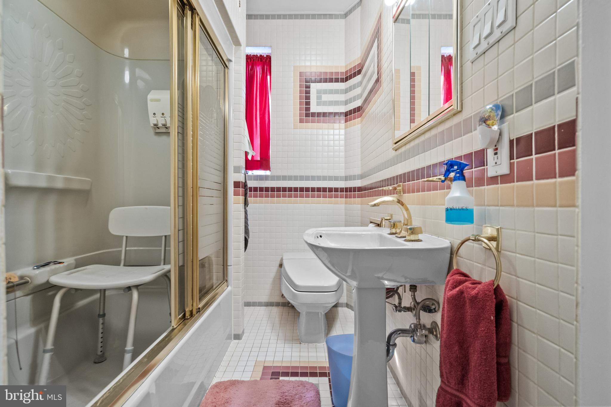 3313 Edgemont Street Philadelphia, PA 19134 - Photo 10 of 22 a bathroom with a sink toilet and shower