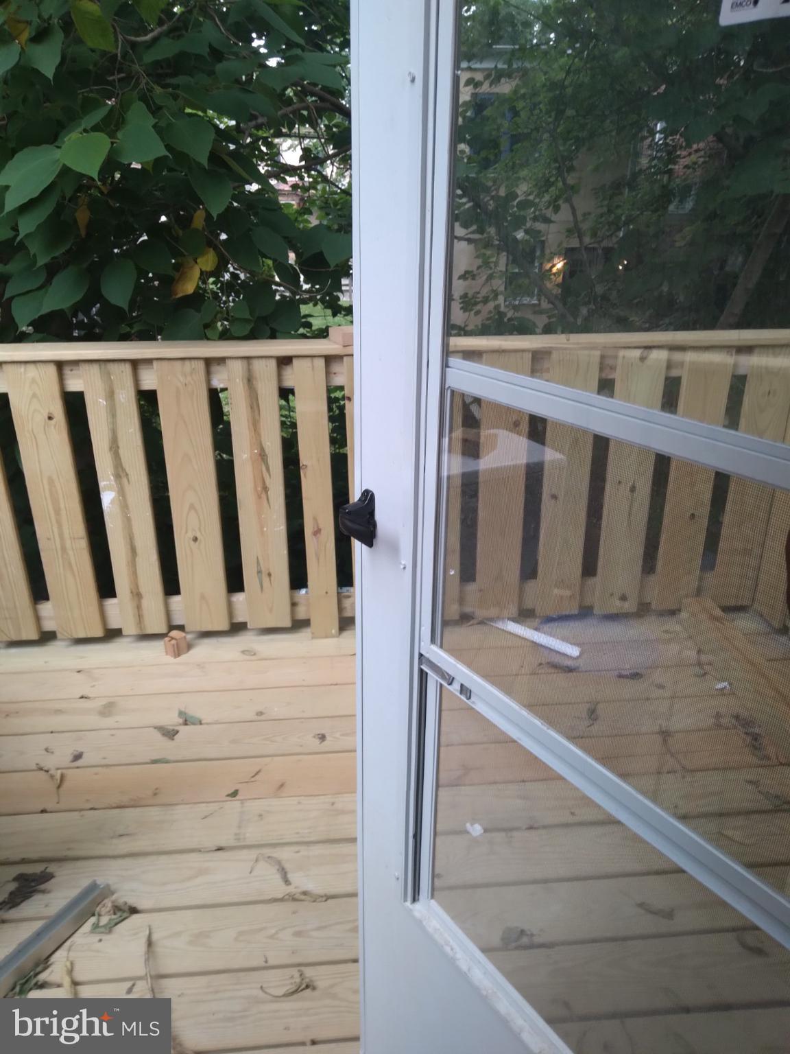 3957 Wallace Street Philadelphia, PA 19104 - Photo 11 of 12 a view of wooden balcony