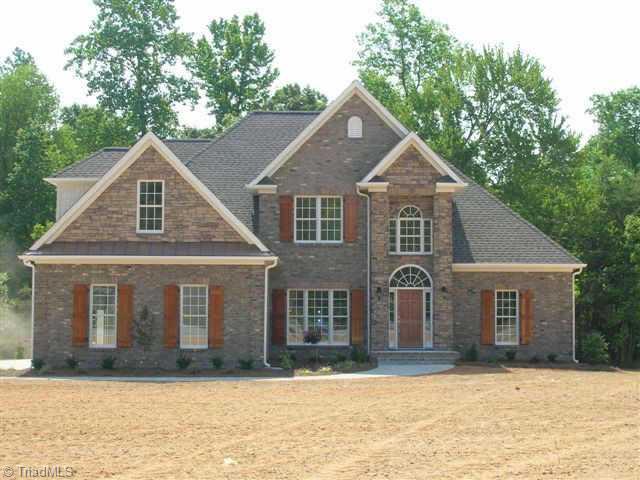 8201 Haw River Road Oak Ridge, NC 27310 - Photo 1 of 9 Exterior Front.