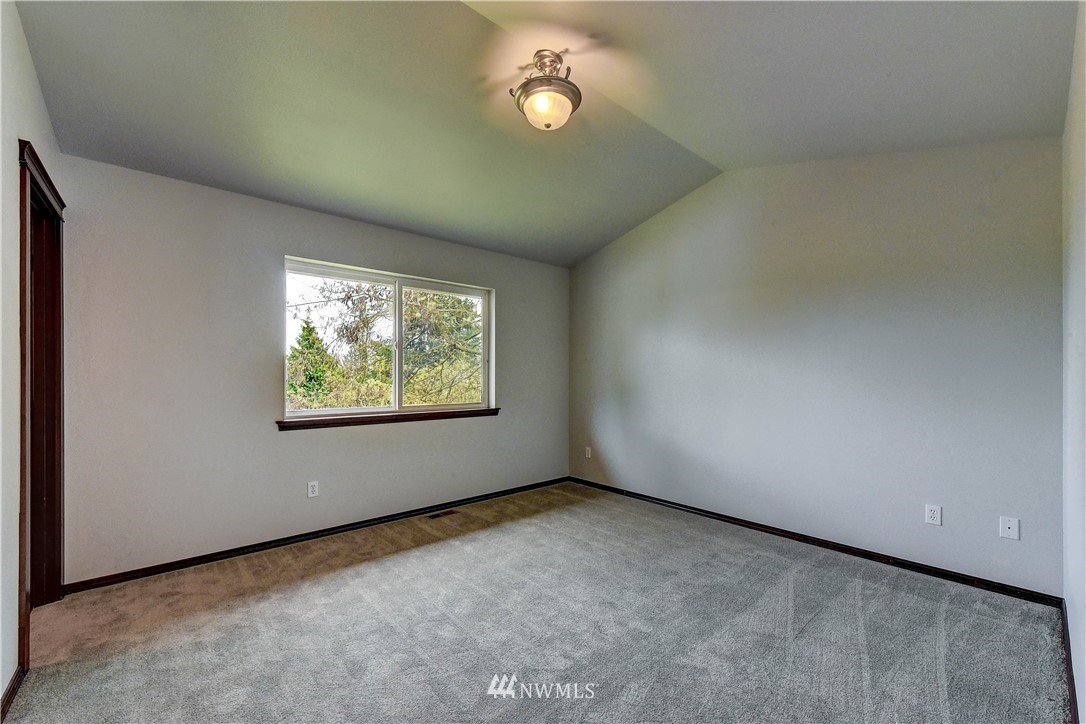 6605 Cady Road Everett, WA 98203 - Photo 12 of 26 a view of an empty room with a window