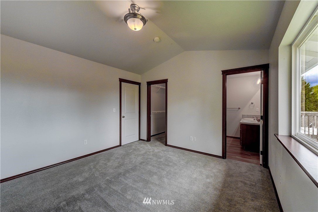 6605 Cady Road Everett, WA 98203 - Photo 13 of 26 an empty room with a empty space and windows