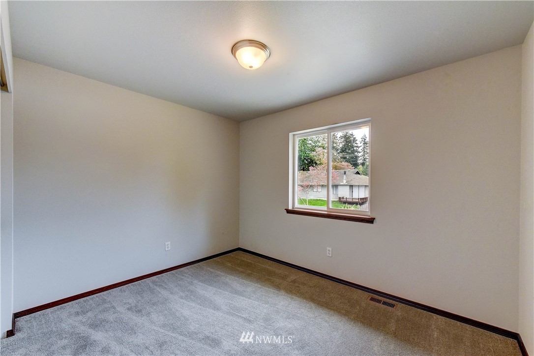 6605 Cady Road Everett, WA 98203 - Photo 15 of 26 an empty room with windows