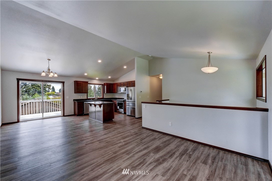 6605 Cady Road Everett, WA 98203 - Photo 4 of 26 a view of kitchen with furniture and wooden floor