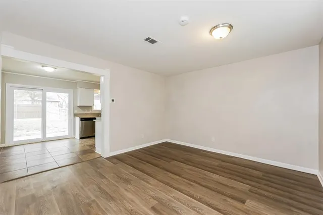 a view of entryway with wooden floor