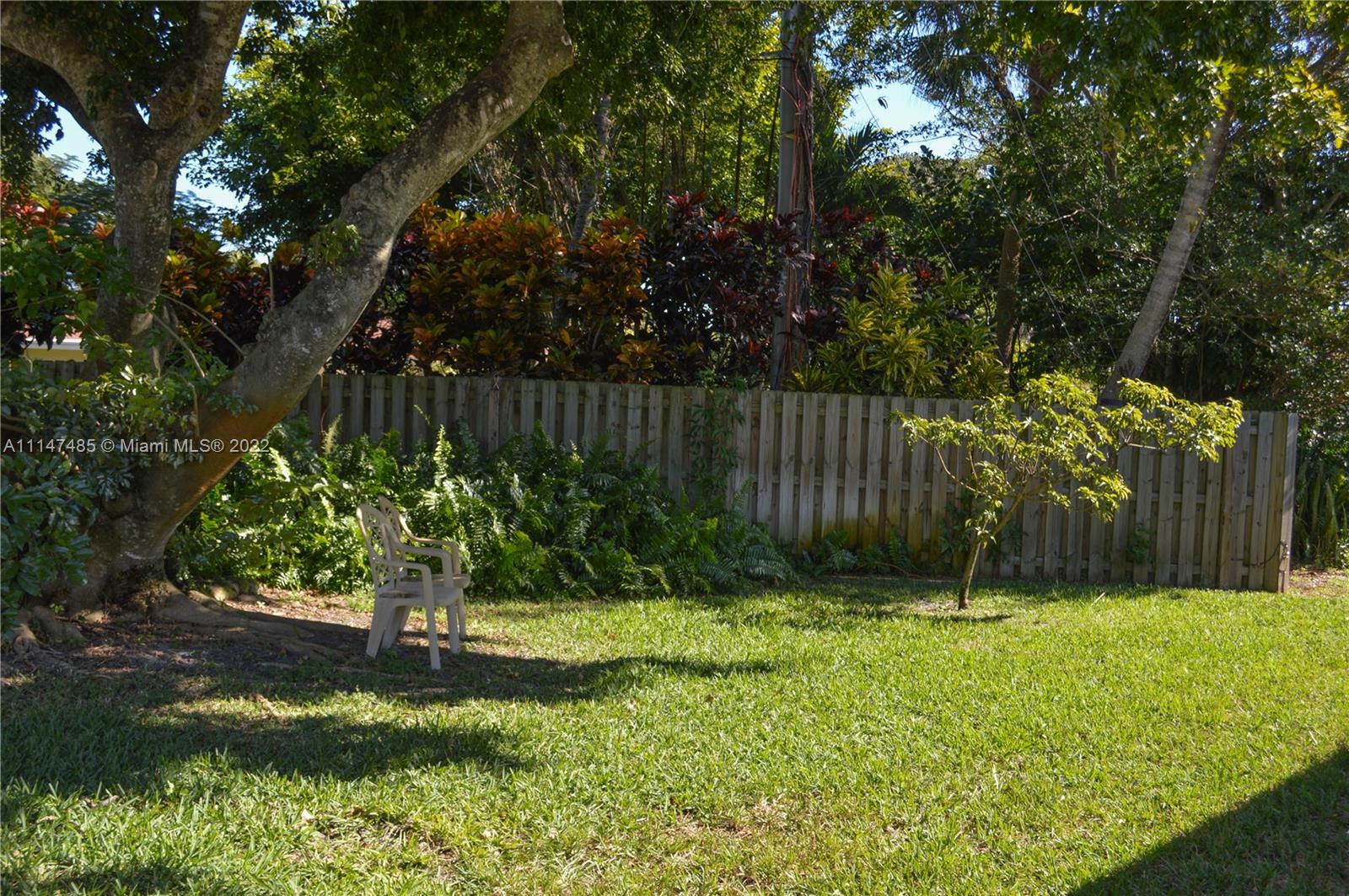 305 Northwest 42nd Street Boca Raton, FL 33431 - Photo 18 of 23 a garden view