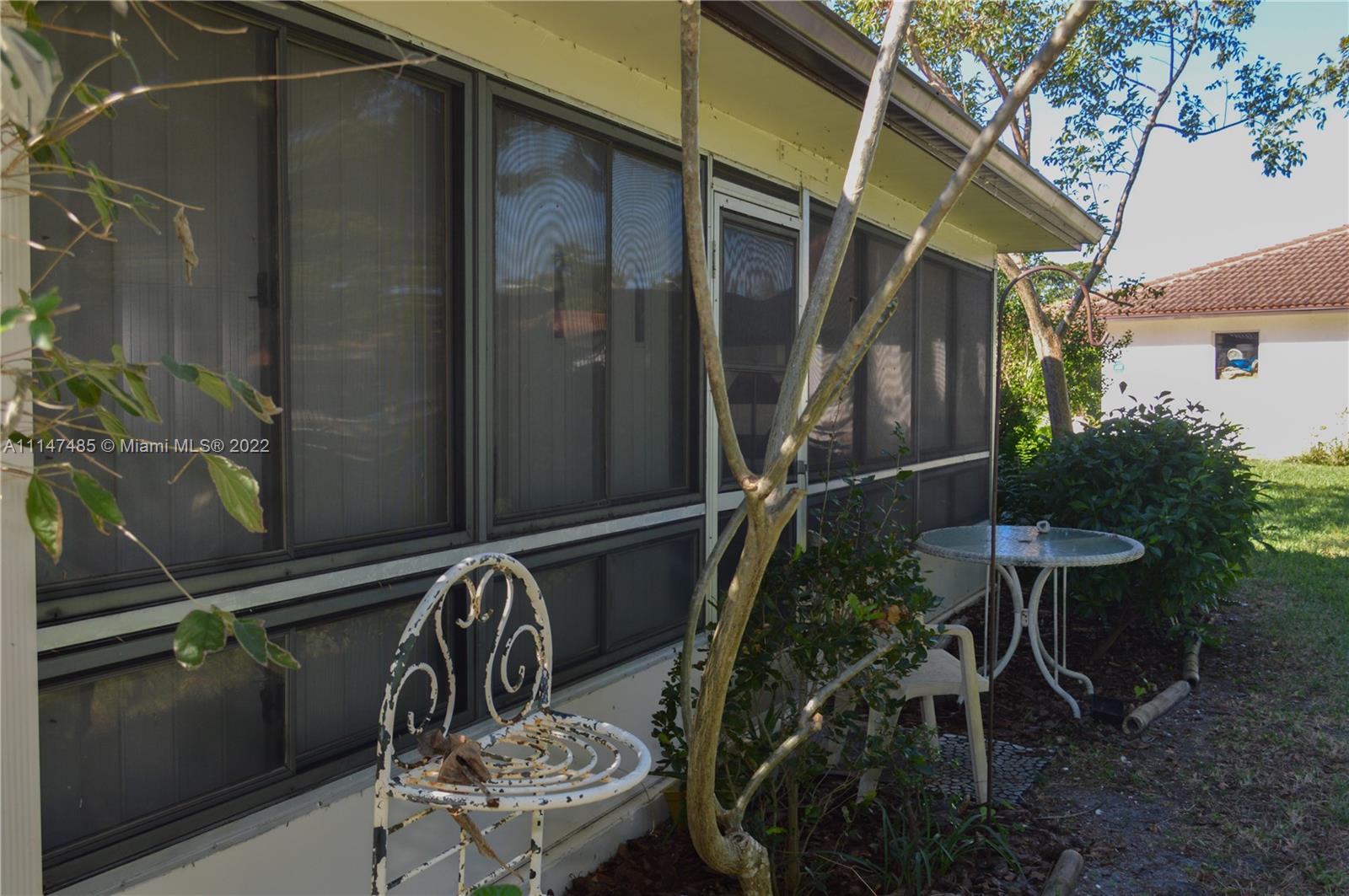 305 Northwest 42nd Street Boca Raton, FL 33431 - Photo 19 of 23 a view of balcony and patio