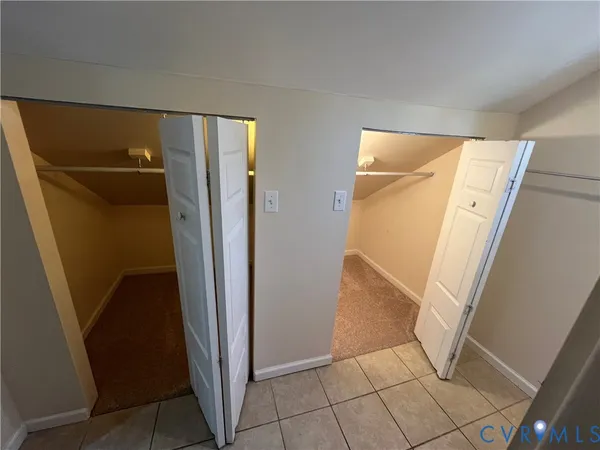 a bathroom with a shower and a mirror