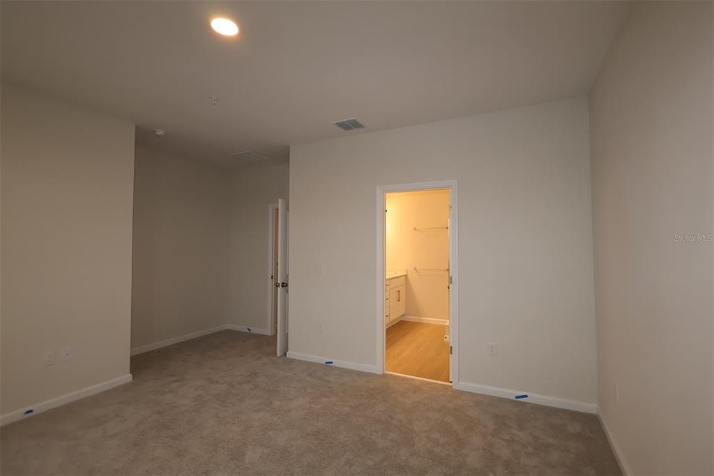 659 Pothos Street Apopka, FL 32703 - Photo 22 of 34 a view of a room with yellow walls