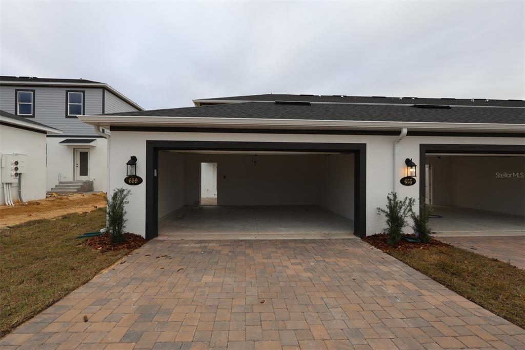 659 Pothos Street Apopka, FL 32703 - Photo 25 of 34 a view of a car garage