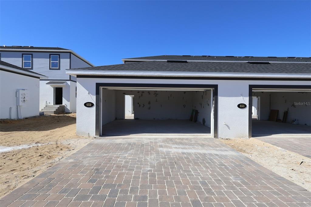 659 Pothos Street Apopka, FL 32703 - Photo 27 of 34 a view of a car garage